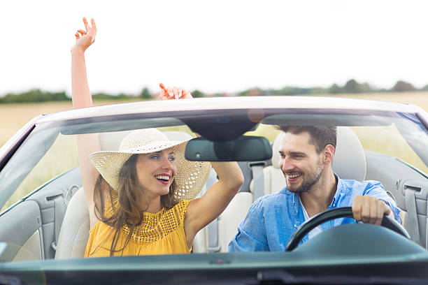 istock Couple in convertible 576715458