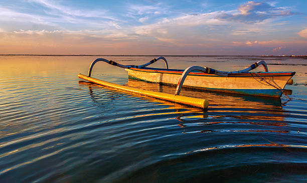 istock Jukung Boat With Water Ripples 576716358