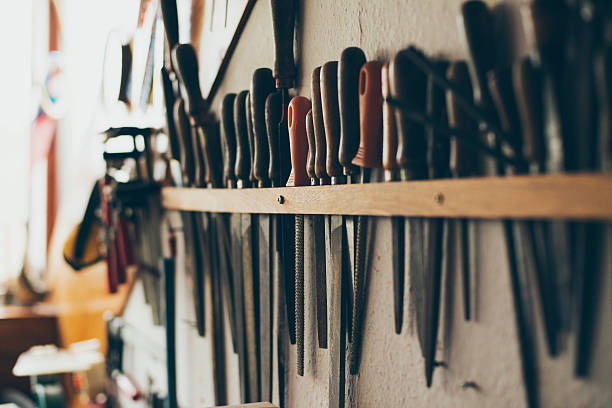 istock Wood rasp files hanging on wall in attic 576718082
