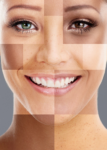 Composite shot of a woman's face made up of different skintones