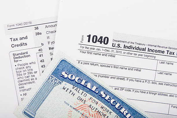 istock Tax return form and SSN card 576720420