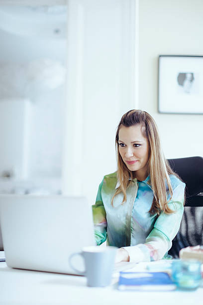 istock Young woman working at home 576721400