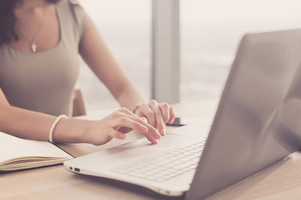 istock Close-up portrait of an office worker browsing, searching and 576723738