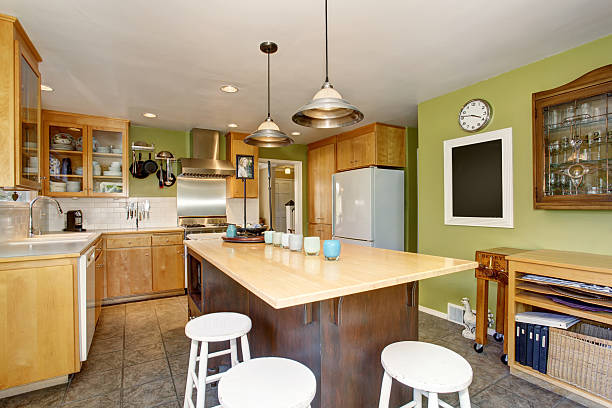 istock Kitchen room interior with large wooden kitchen island, 576724604