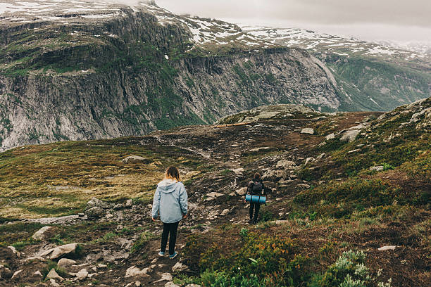 istock Two people hiking in mountains 576725862