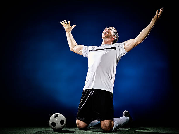 istock soccer player man isolated 576727856