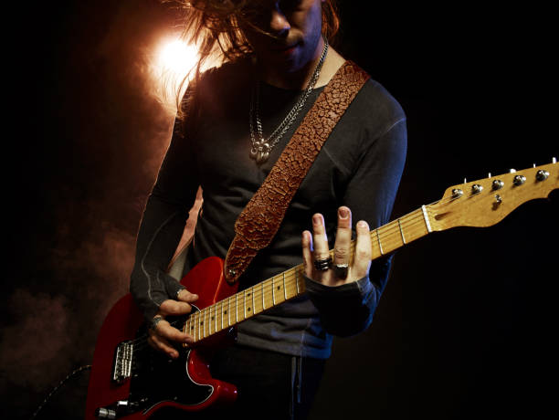istock The guitarist plays solo. 576728202