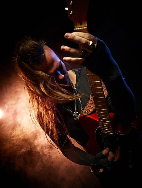 istock The guitarist plays solo. 576728334