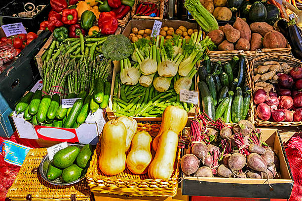 istock Fresh vegetables on display outside a greengrocers store 576730192