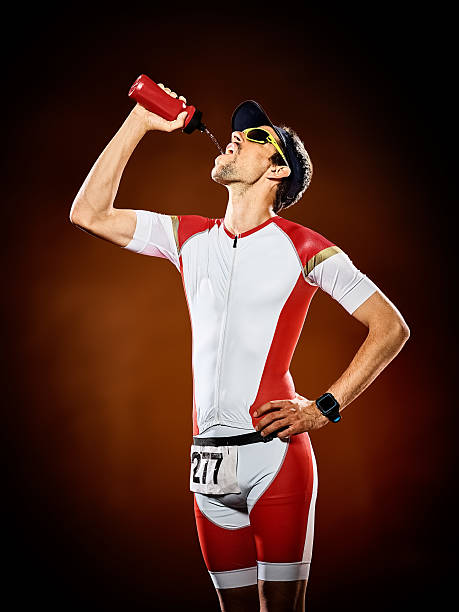 uomo corridore che corre triathlon ironman isolato - jogging ironman triathalon triathlon ironman foto e immagini stock