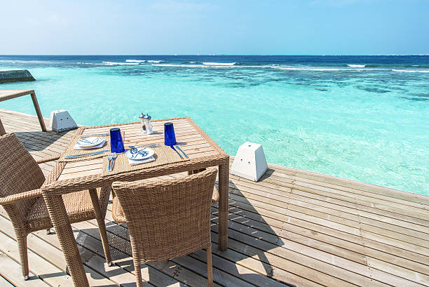 istock Restaurant tables on the sea view terrace 576732656