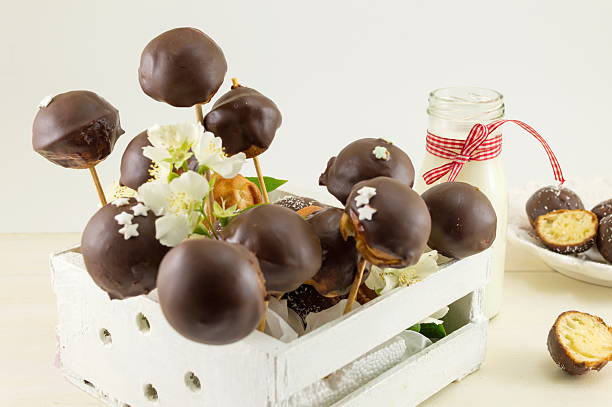 istock Chocolate cake pops in a wooden box 576733766
