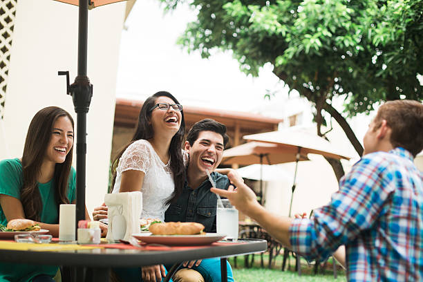 istock Friends in good humor at table 576735640