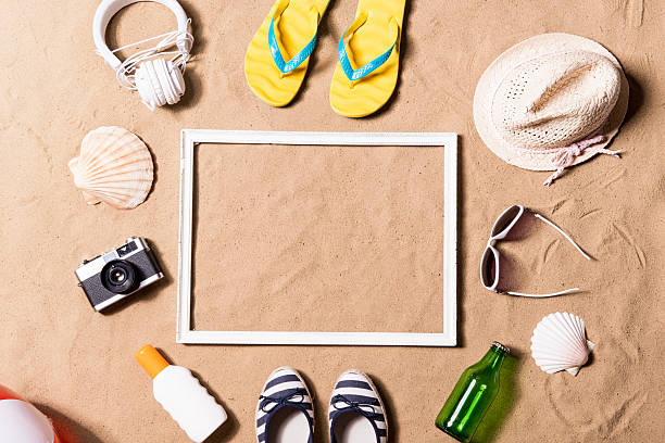 Summer vacation composition. Picture frame, hat and other stuff