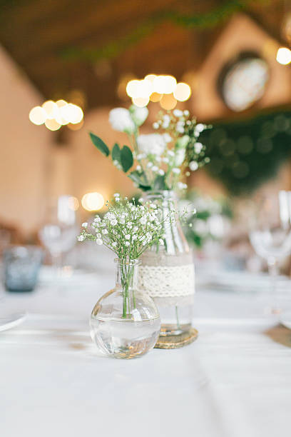 istock Wedding decorated bottle with flower 576737218