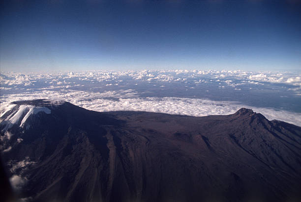 Mount Kilimanjaro the highest point in Africa, Tanzania Mount Kilimanjaro the highest point in Africa with 5895 meters above sea level on the left, Mawenzi peak on the right, Tanzania mawenzi stock pictures, royalty-free photos & images