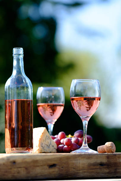 istock rose wine cheese and grapes 576738494
