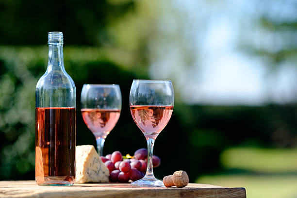 istock rose wine cheese and grapes 576738820