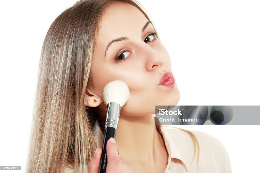 Makeup Applying closeup Makeup Applying closeup. Cosmetic Powder Brush. Perfect Skin Make-Up Stock Photo