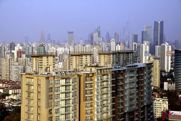 Sprawling Shanghai cityscape viewed from Cloud 9 building, Zhongshan Park. In the background, the tall skyscrapers of Jing'an and Lujiazui trade zone. 