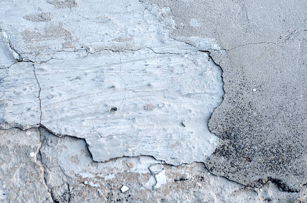 istock Grunge concrete cement wall with crack in industrial building, 576743856