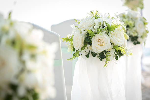 bridegroom and bride's hands in a prayer.