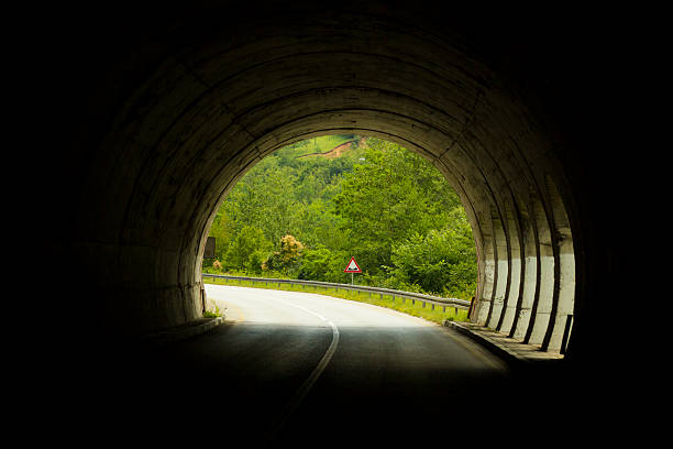 istock Road with end of the tunnel. 576746088