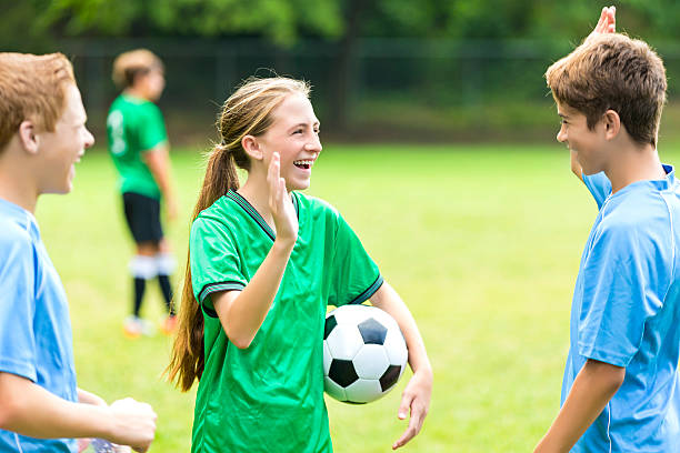 istock Soccer players prepare to high five after game 576746142