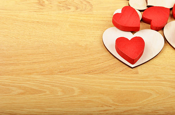 istock Heart on wooden background 576746216