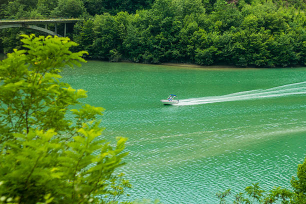 istock Motor boat driving on the Blue Water. 576747116