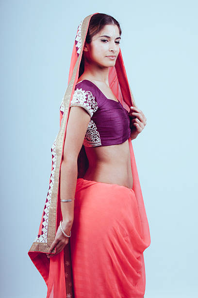 istock woman in traditional indian clothes 576747144