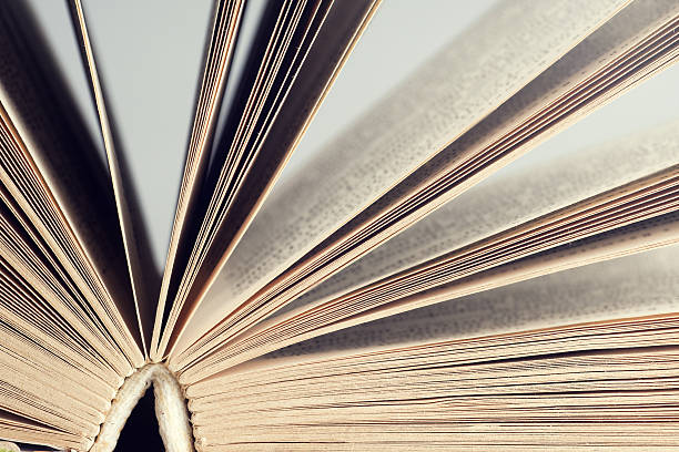 istock old book. seamless texture of book pages. 576747768