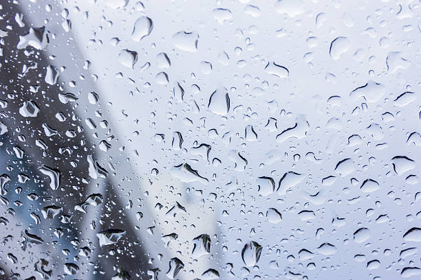 istock Drops of rain on glass , rain drops 576748264