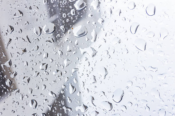 istock Drops of rain on glass , rain drops 576748372