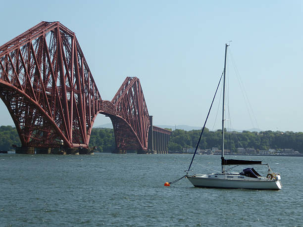 Forth Bridge and Yacht stock photo