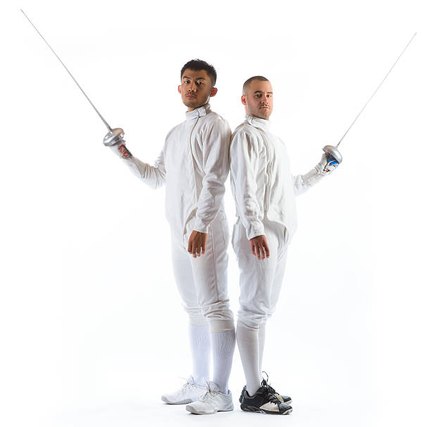 Fencing athletes or players isolated in white background stock photo