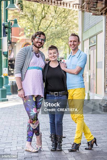 Trio Of Gender Fluid Young People Downtown Stock Photo - Download Image ...