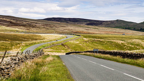 istock Meandering moorland road 576752622