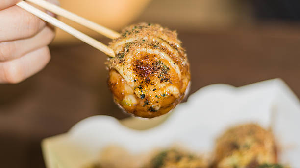 istock Takoyaki, delicious Japanese style octopus pancake, 576752890