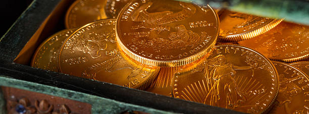 istock Collection of one ounce gold coins 576755376