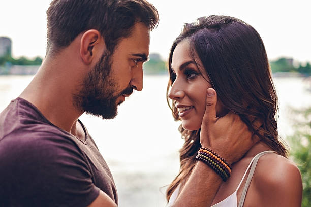 istock Boyfriend holding his girlfriend and going for a kiss 576756924