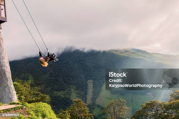 Silhouette Of Young Happy Blonde Woman On A Swing Stock Photo - Download Image Now - Activity, Adrenaline, Adult