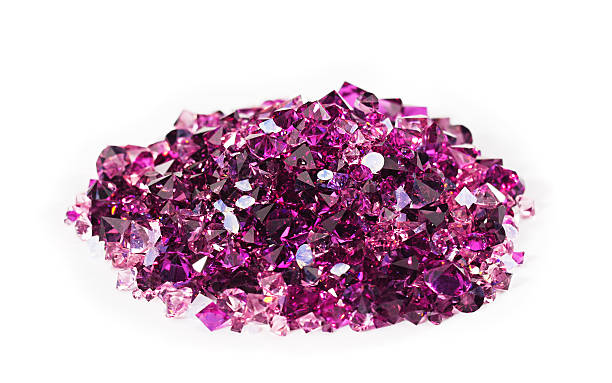 istock Violet jewel stones heap over white 576891828