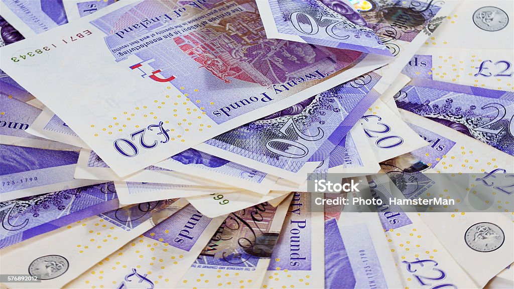 Pound sterling bank notes Pound sterling bank notes business background British Currency Stock Photo