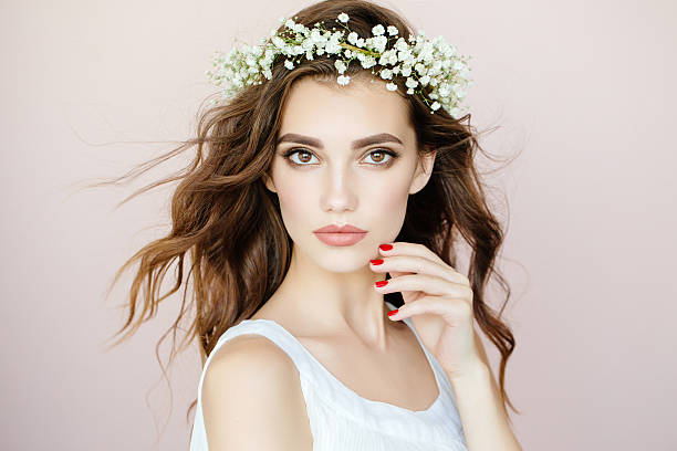 istock Beautiful woman on light background 576892388