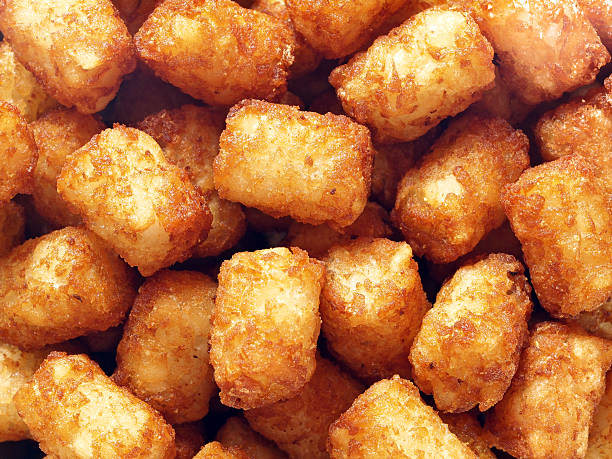 rustic golden potato tater tots food background