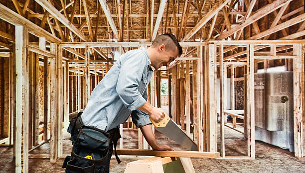 Building contractor working in construction site Building contractor working in construction sitehttp://www.twodozendesign.info/i/1.png rotary blade stock pictures, royalty-free photos & images