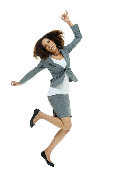 istock Cheerful businesswoman jumping 576895412