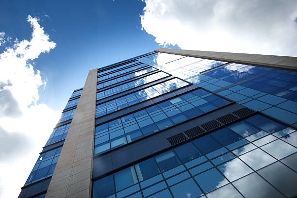 istock Modern Building Exterior Windowwall, Cloudscape Reflections, Extreme Wide Angle 3XL 576900202