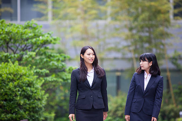 istock Female Japanese Business executives have a discussion 576904752